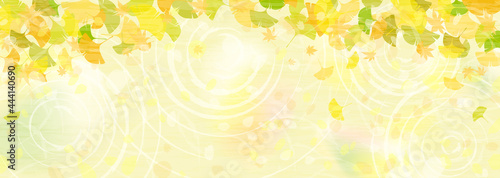 カラフルに色づいた銀杏の葉の横長背景イラスト