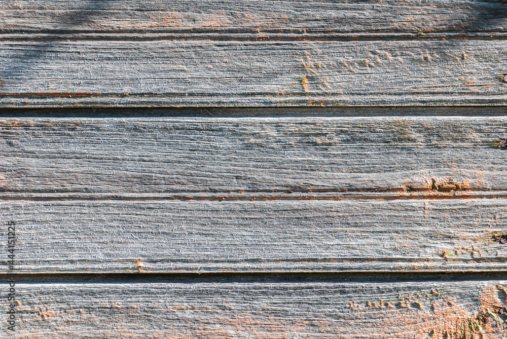 Old wooden board or boards. Faded with age. Old wooden board or boards. Faded with age.