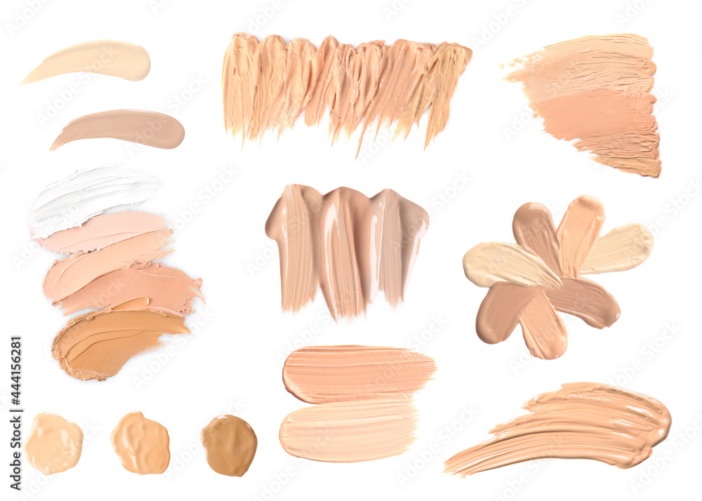 Set with different liquid foundation on white background Set with different liquid foundation on white background
