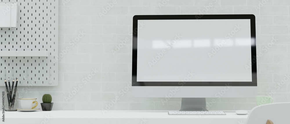 Modern workspace with computer, stationery, and decorations on the desk in white brick wall room, 3D render Modern workspace with computer, stationery, and decorations on the desk in white brick wall room, 3D render