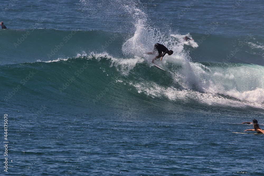 Surfing summer waves n Malibu California