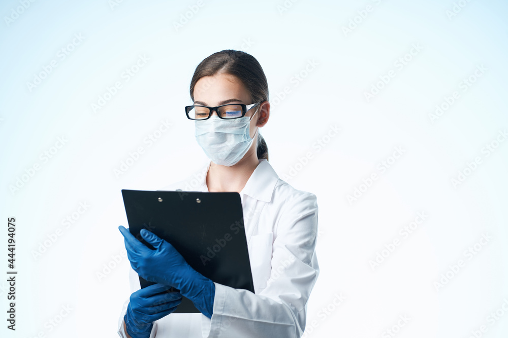 woman laboratory assistant wearing medical mask chemistry science technology