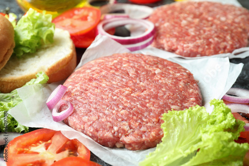 Concept of cooking burger with burger ingredients, closeup