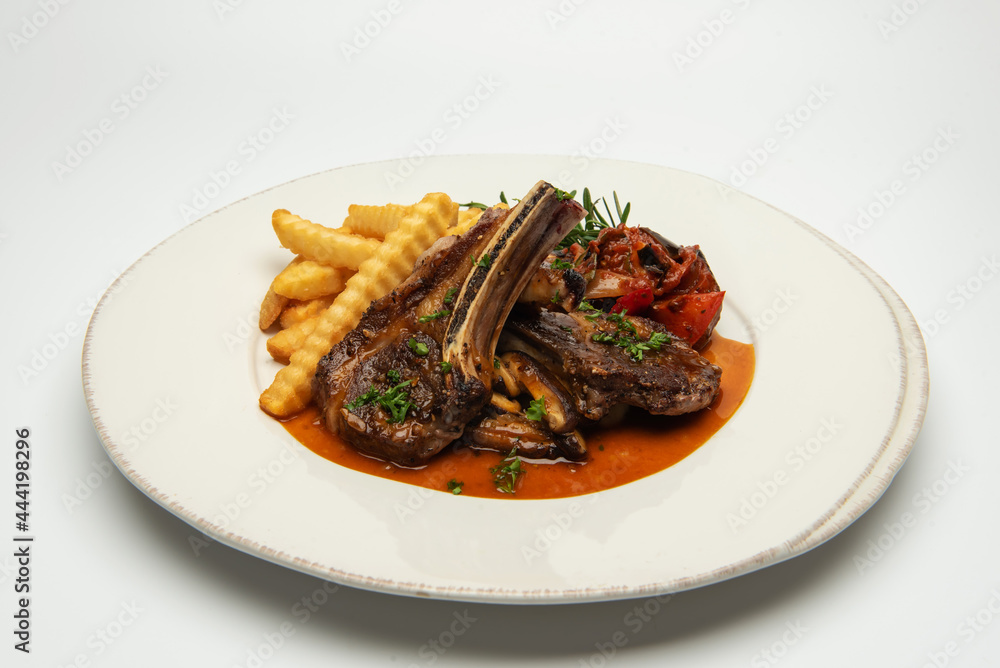Barbecue spare ribs on an rustic table. Barbecue spare ribs on an rustic table.