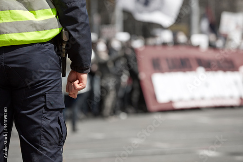 Police officer on the street in urban environment.