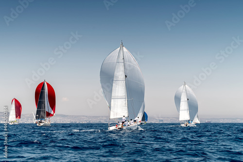 Sailboat race with multiple yachts