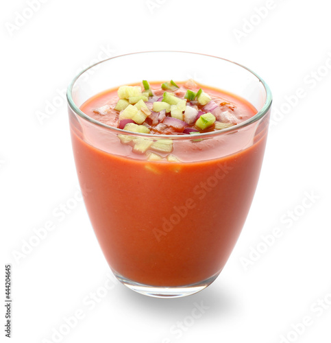 Glass with tasty gazpacho on white background