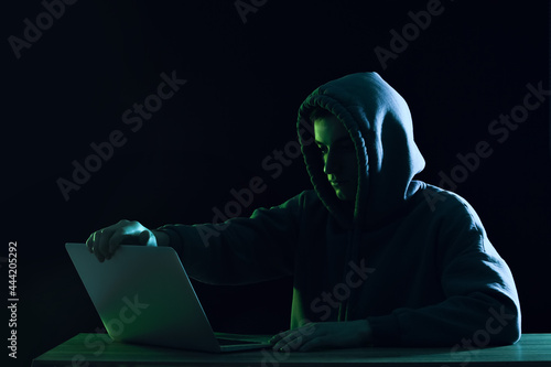 Silhouette of hacker with l...