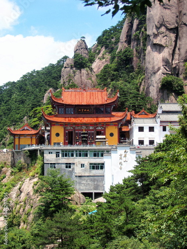 Wall Mural sacred chinese buddhist temple on mount jiuhua as seen from the tramway on a sun