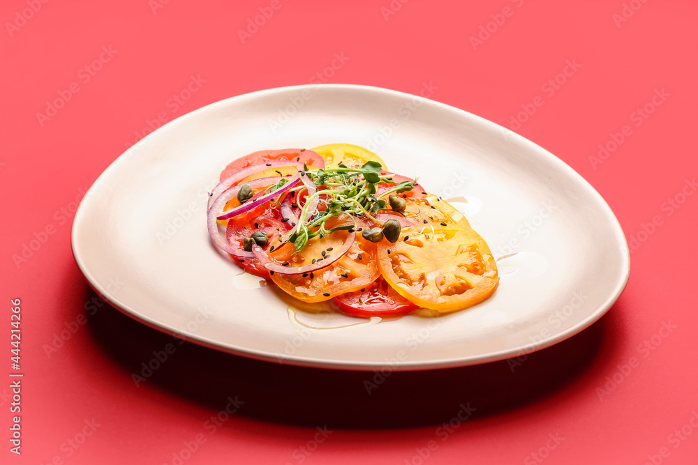 Plate with tasty tomato carpaccio on color background Plate with tasty tomato carpaccio on color background