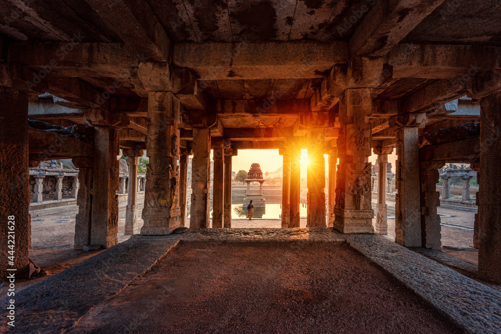 View of sunrise at Pushkarni, Sri Krishna tank in ruins. Hampi, karnataka, India.