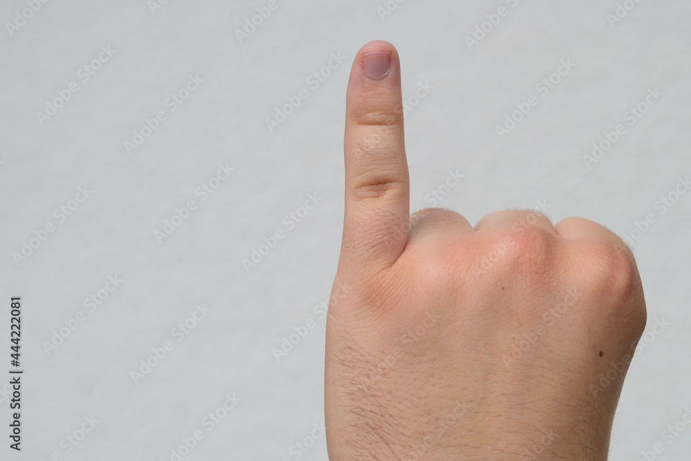 Man showing his little finger or pinky finger in close up Man showing his little finger or pinky finger in close up