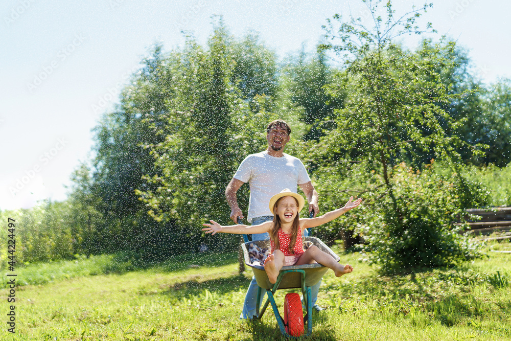 happy-little-girl-preschool-age-has-fun-laughs-riding-on-garden