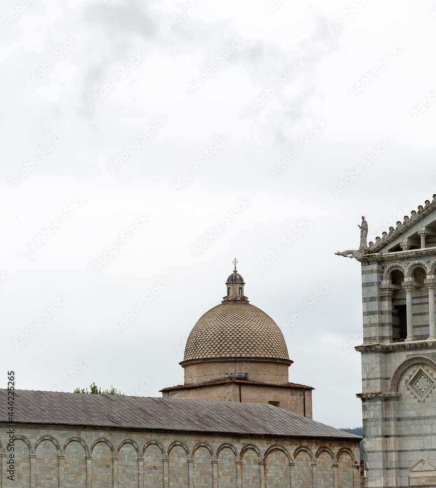 View to the cathedral of Pisa located on Piazza dei Miracoli (Square of Miracles)