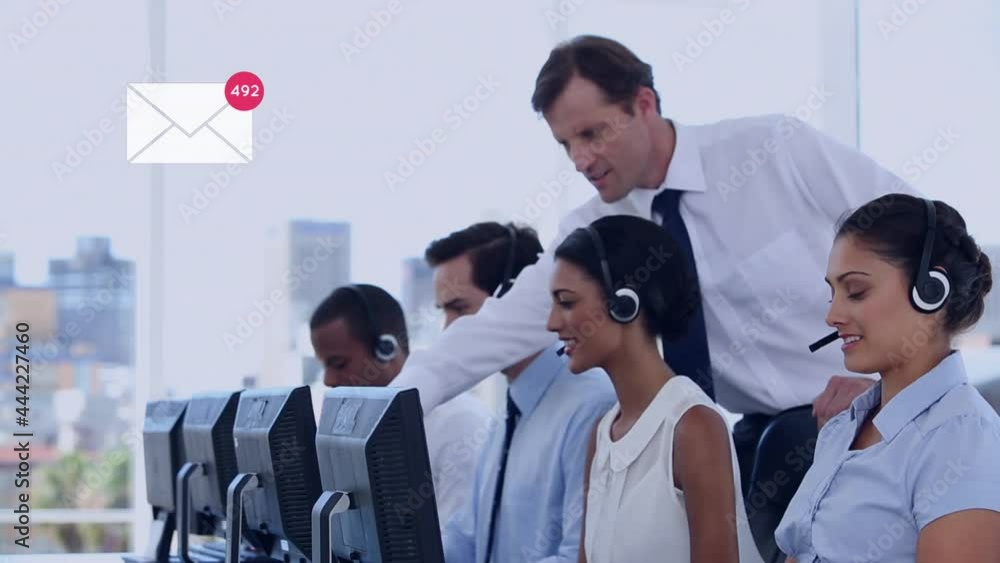 Animation of numbers changing over business people wearing phone headsets Animation of numbers changing over business people wearing phone headsets