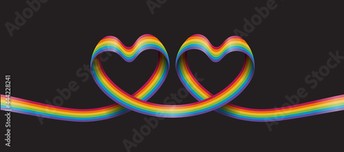 rainbow pride ribbon roll make twin heart shape on dark background vector design