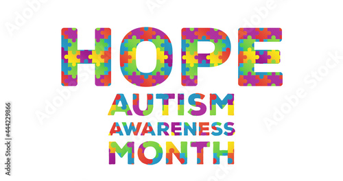 Digitally generated image of with puzzle elements forming Hope Autism Awareness Month text against w