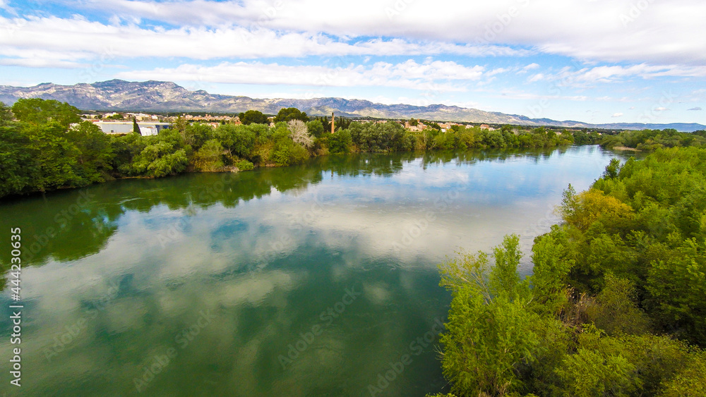 aerial views of the ebro river with boats and villages aerial views of the ebro river with boats and villages