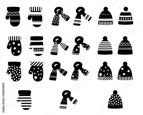 a set of winter colored hats, scarves and mittens with a pattern. vector isolated on a white background