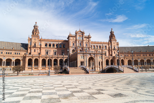 Front view of the main building in the Plaza de Espana in Seville (Andalusia, Spain). Architectural complex and emblematic place of the city. Monumental and historical building in Andalusia.