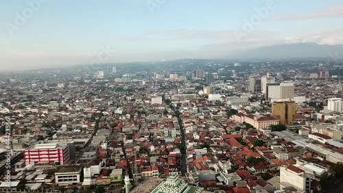 ongested city aerial and mountain shadow