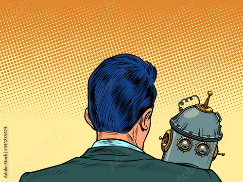 An emotional robot is sad on the shoulder of its creator. Engineer and product. Artificial intelligence and humanity