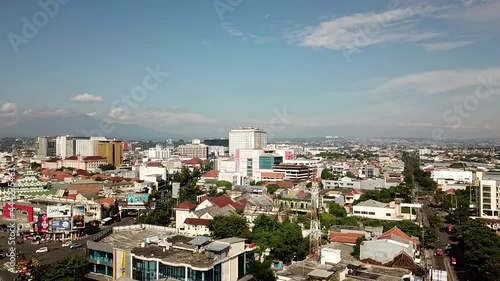 aerial drone tilt city with mountain background