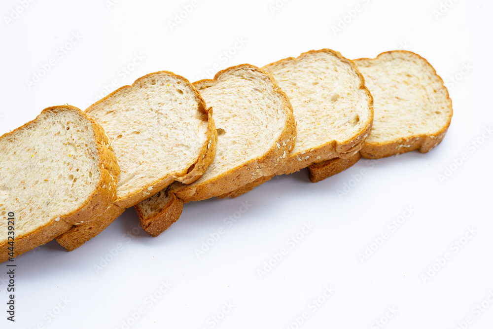 Sliced wholegrain bread on white background. Sliced wholegrain bread on white background.