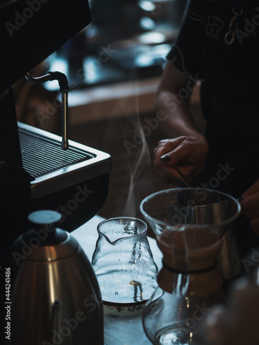 Close-up of a barista making coffee in a purover