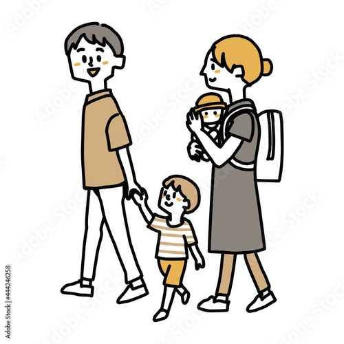 赤ちゃんを抱っこして歩く家族