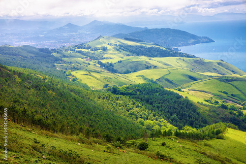 Fototapeta Naklejka Na Ścianę i Meble -  Panoramic view of the slope of the Jaizkibel mountain and the coast of the mouth of the Bidasoa river, Euskadi, Spain