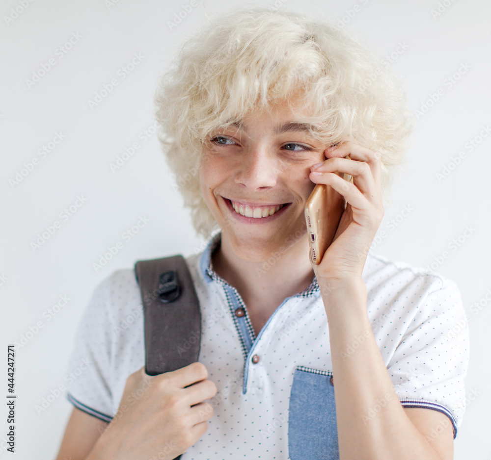 Happy young man talking of mobile phone Happy young man talking of mobile phone