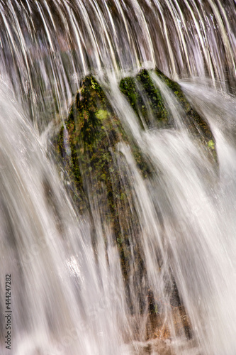 Beautiful veil cascading waterfalls  mossy rocks