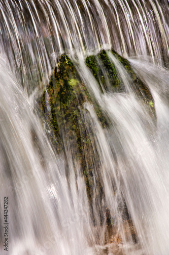 Beautiful veil cascading waterfalls, mossy rocks