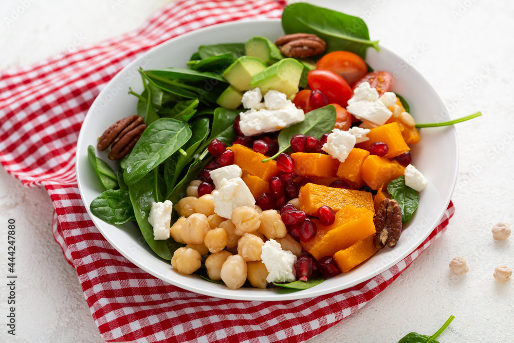 Autumn winter pumpkin salad with avocado healthy food Autumn winter pumpkin salad with avocado healthy food
