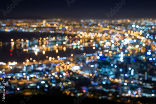 Blurred city lights of Cape Town, South Africa by night.