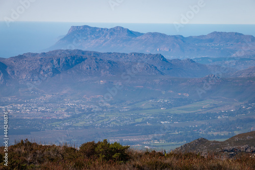 Scenic view from top of Table Mountain to Mountains at Cape of Good Hope peninsula and Westlake, Cape Town, South Africa.