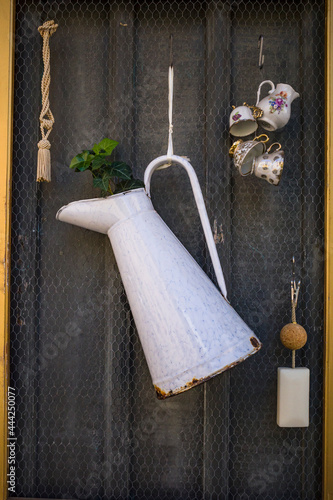 Gothenburg, Sweden A ceramics pitcher and a bar of soap hanging ona doore at a store. photo