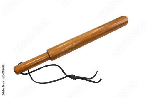 Antique wood truncheon club from the 1920s isolated on white. photo