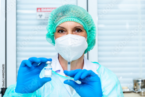 Doctor  woman nurse  scientist hand in white gloves holding bottle  syringe coronavirus  covid-19 vaccine disease preparing for a child  adult  man and woman vaccination shot medicine and drug concept