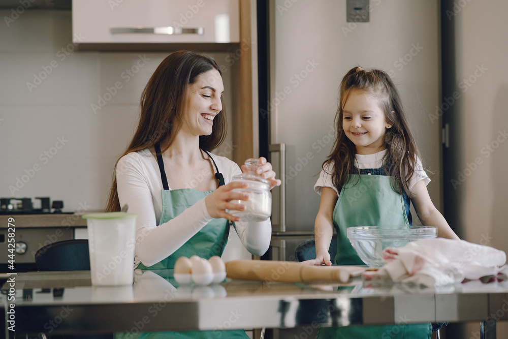 Family cook the dough for cookies Family cook the dough for cookies