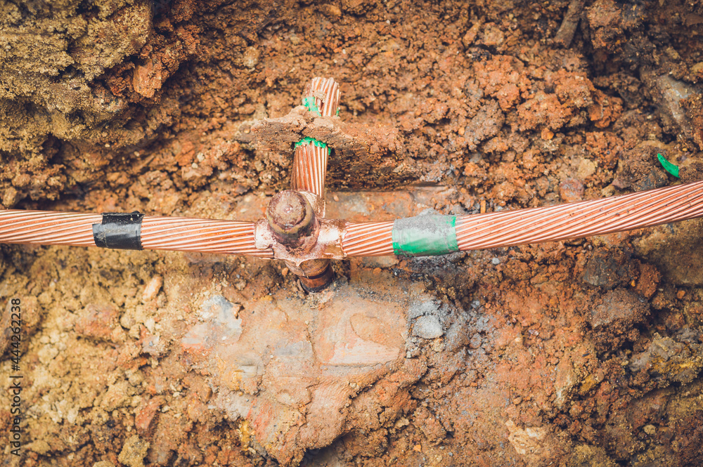 Welding copper ground wire on ground rod.Welding copper ground wire
