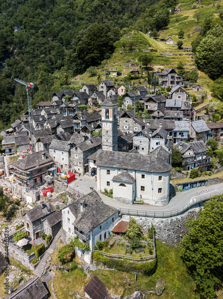 Obraz premium Aerial image with drone of the mountain village Corippo - the smallest commune in Canton Ticino, Switzerland