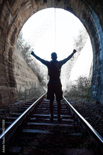 Man figure on lingh - End of Tunnel concept stock photo © Adam Radosavljevic