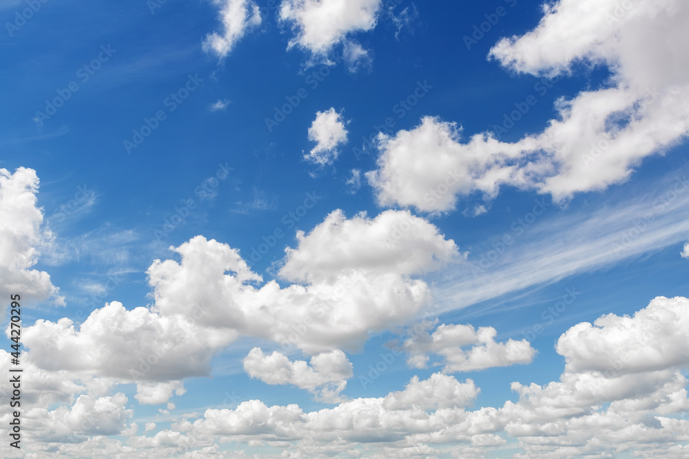 Natural beautiful abstract scenic azure blue sky with white cumulus clouds background on bright sunny summer day. Nature cloudscape tranquil landscape scene backdrop pattern Natural beautiful abstract scenic azure blue sky with white cumulus clouds background on bright sunny summer day. Nature cloudscape tranquil landscape scene backdrop pattern