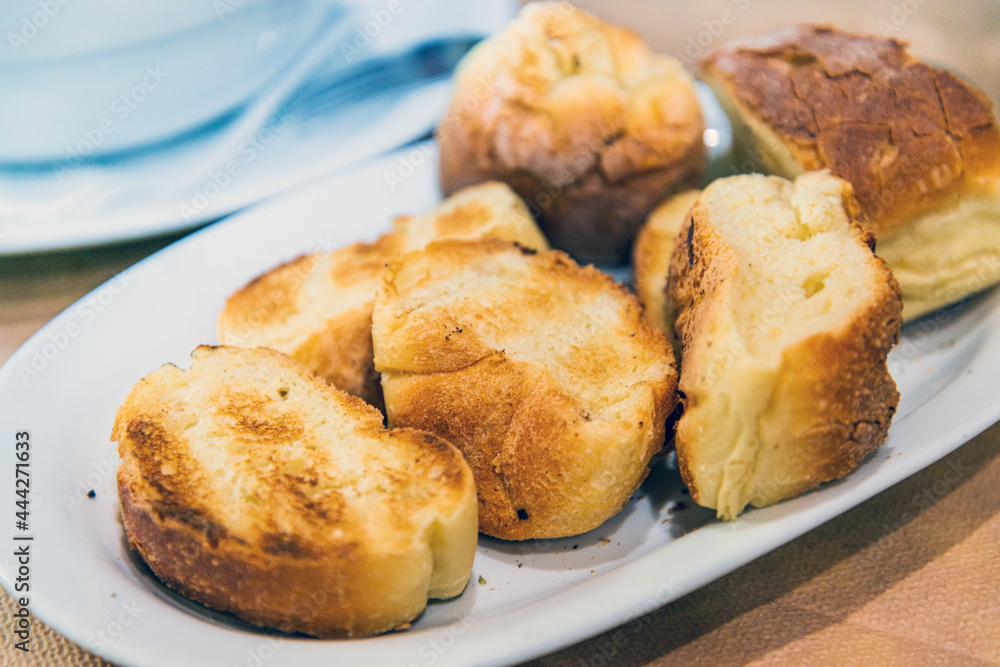 Delicious breakfast bread on table