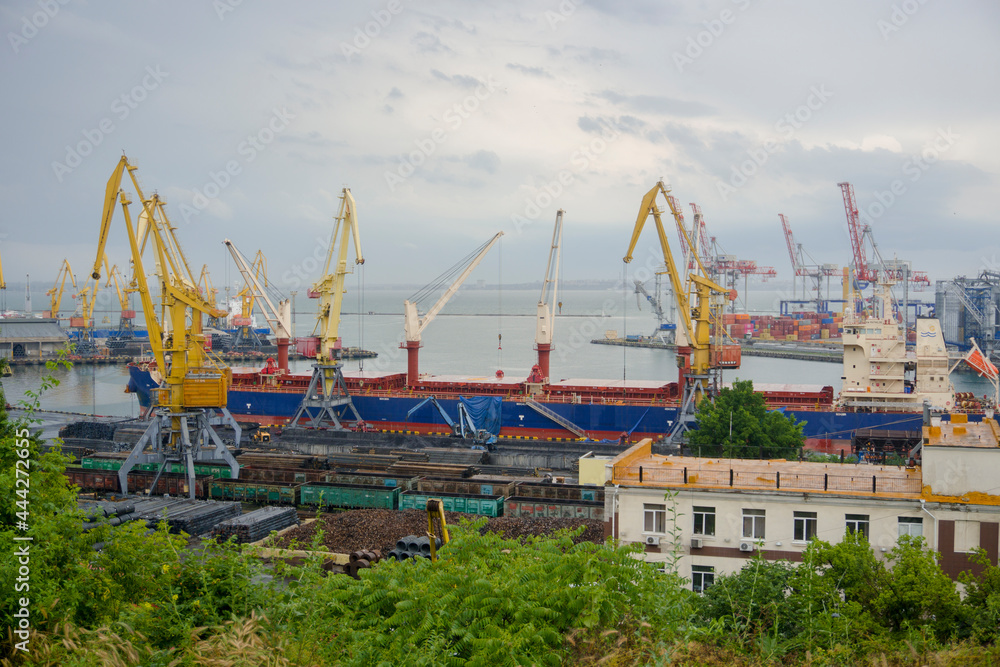 Seaport shipyard on a cloudy summer evening