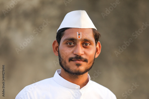 Young indian man (pilgrim) in traditional wear. photo