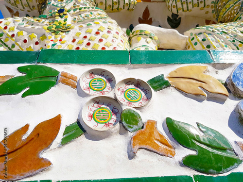 Wall decorations of Wat Arun in Bangkok, Thailand