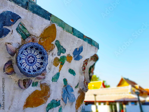 Wall decorations of Wat Arun in Bangkok, Thailand